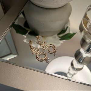 Gold dangle earrings with faux pearl